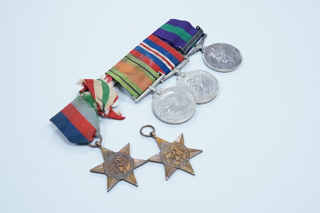 A WWII medal group awarded to Fg. Off. A.J. Fransella R.A.F., comprising of five medals including the Defence Medal, the 1939-1945 Medal, the Italy Star, the 1939-1945 Star and the General Service Medal with clasp for Pa